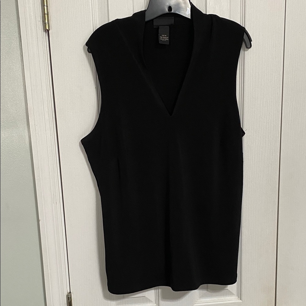 Woman’s Lane Bryant sleeveless black dress top.
